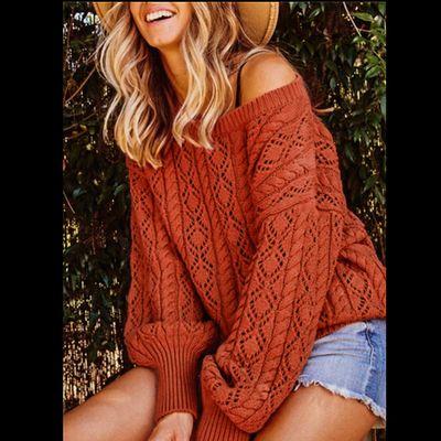 Love this rust-red knitted sweater