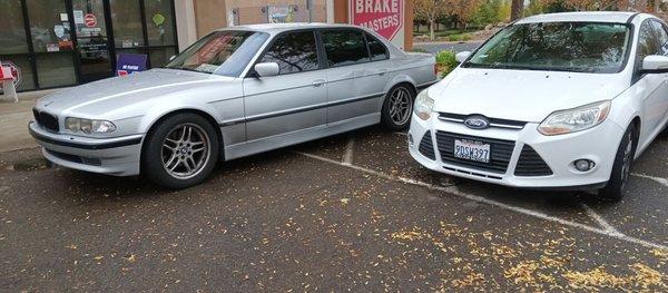 The two vehicles parked in the fire zone So where you can't gain access to the handicap parking spots.