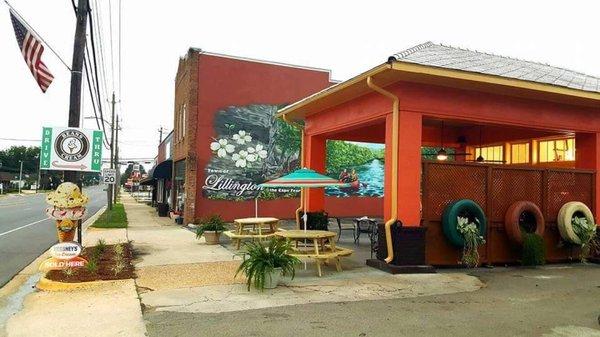 Funky outdoor seating overlooking the town mural.