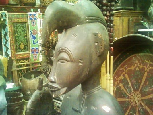 amazing masks, African statuettes, wood carvings, leather lampshades etc here