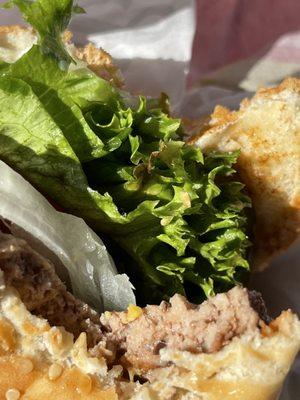 Brown old lettuce inside famous star burger