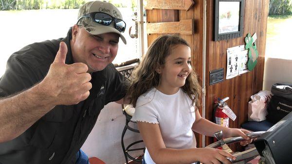 Capt. Billy lets the Kids Drive the Boat on the way back to the Dock.