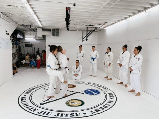 Sunday Women's Jiu Jitsu where the moms can roll and the kids can play