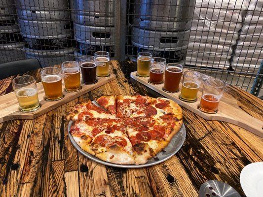 Pepperoni pizza and two flights of beer