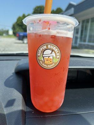 Grapefruit tea with lychee bubbles.