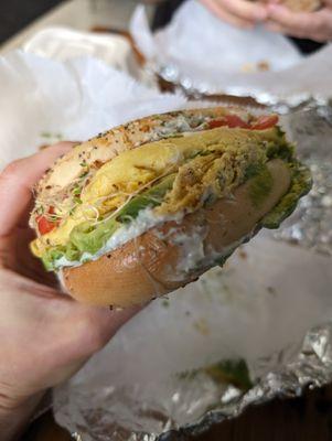 The Garden Sprout: NO veggie sausage, avocado, tomato, alfalfa sprouts, and chive tofutti served on a bagel. Added vegan egg.