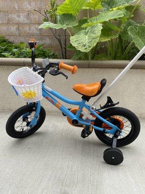 Blippi 12 inches baby bike (we added the plastic poles to help push her)