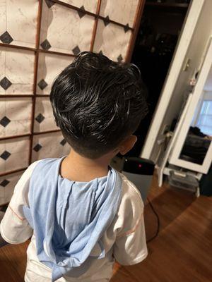 They stylist did a great job for his first haircut