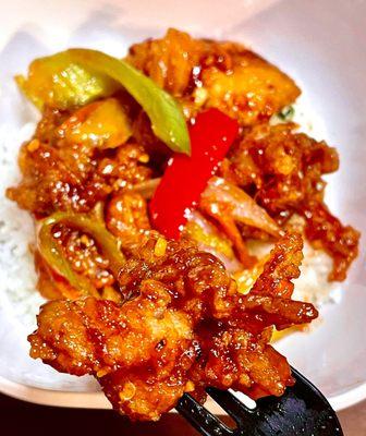 5. Szechuan Crispy Chicken w/ chili peppers, onion, red & green bell peppers in a spicy savory sauce over white rice - takeout