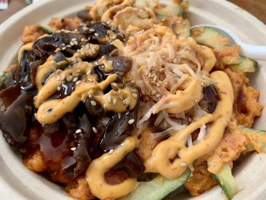 Large spicy tuna bowl mixed with cucumbers & topped with shiitake mushrooms, crab salad, spicy Mayo, & BBQ soy!