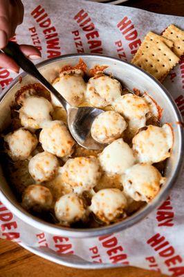 Baked Cheesy Shrooms- Filled with a spicy cream cheese and vegetable stuffing, topped with mozzarella and baked until golden brown.