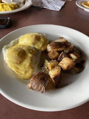 Steamed Eggs Hollandaise with Irish bacon and house made home fries.