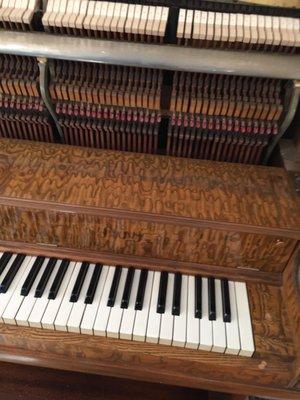 This is an Oak piano (marble type wood) that I put satin keytops on