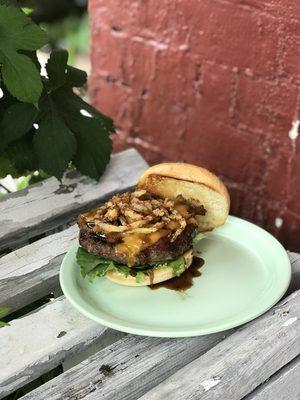 On special !  BOSS Burger . Gourmet patty. Cheddar, bacon , Housemade Boss Sauce, onion straws! Yum!