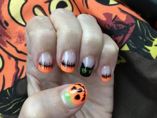 Glow in the dark cat eyes and Jack o lantern!