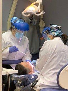 Dr.Pham and Melissa wearing their PPE.