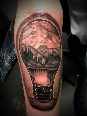 Light bulb scenery tattoo done by Tyler Suggs, Inbox For Booking.