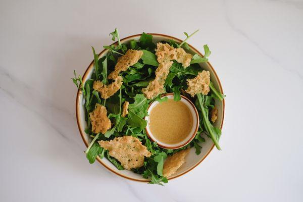 Arugula Salad (GF) // crispy parm, dill pickle pork fat vinaigrette