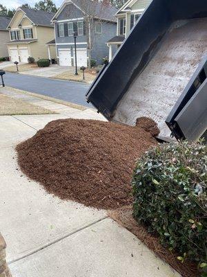 Mulch being delivered