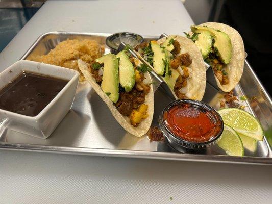 Try our Al Pastor tacos!