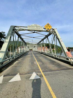 The adjacent bridge next to The Bridge of Flowers is a vehicle & pedestrian bridge in Shelburne Falls MA