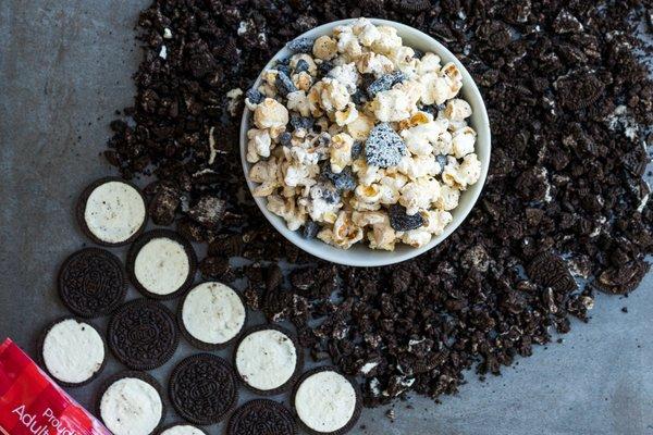 Cookies n' Cream flavored popcorn, available in popcorn bags and tins!