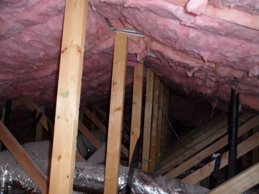 Placing fiberglass batting insulation on an attic ceiling is very bad!