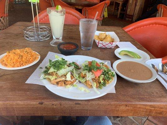 Chicken tostadas, with beans and rice.