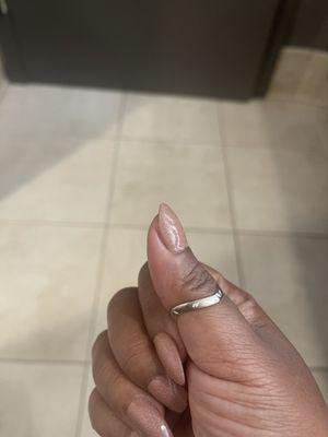 Uneven super short nail AFTER I told her I needed a tip