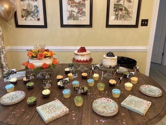 Cake and cupcakes for an engagement shower.