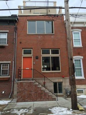 Brick and stone front along with custom brick and stone steps.