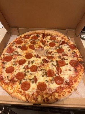 Pepperoni and ground beef pizza