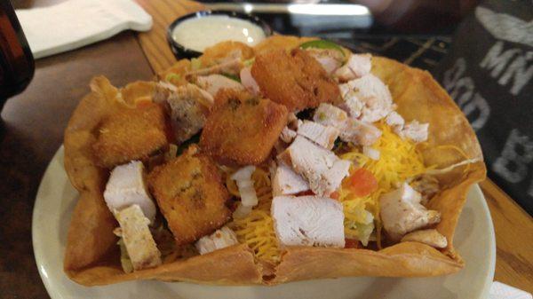 Taco salad with marinated grilled chicken and house made croutons