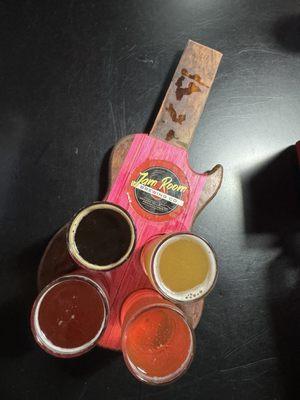 My flight of beers served on this super cute board.