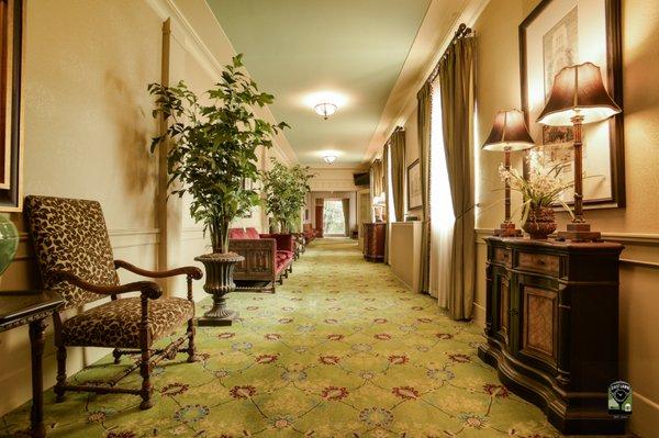 The chapel hallway connects the lobby to the chapel and was designed to recreate the original look and feel.