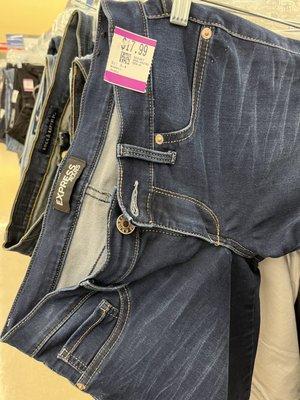 Very worn jeans that are overpriced.