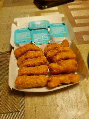 Chicken nuggets packed all in a row...