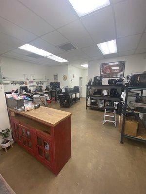 Looking back to espresso machine repair shop.