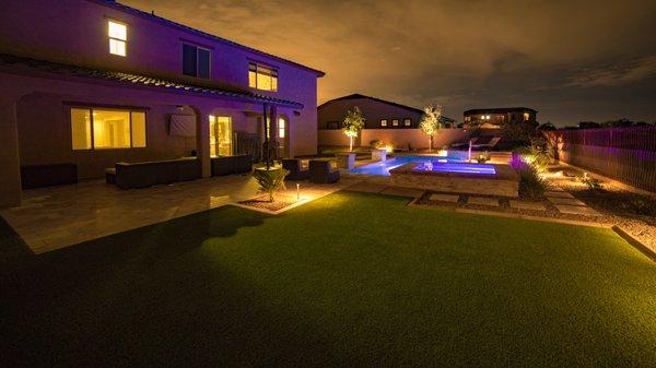 Artificial grass is low maintenance around the pool area.