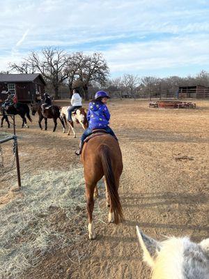 Doing laps around the set up area before going on the trail.