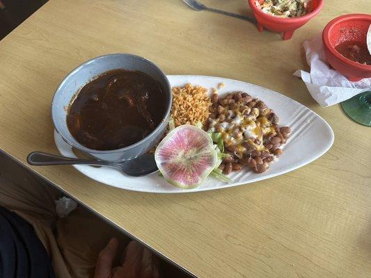 Chicken mole plate with whole beans