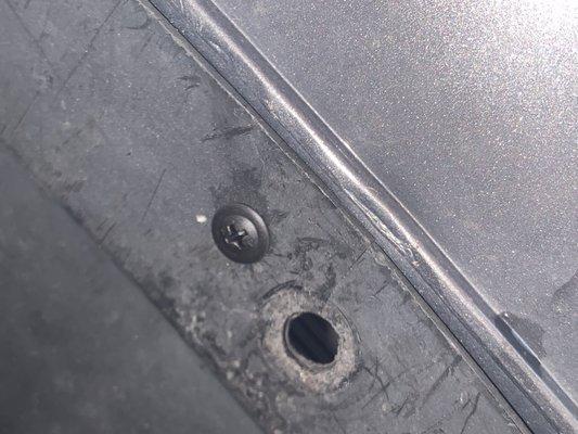 Screw on splash guard to bumper  under vehicle.