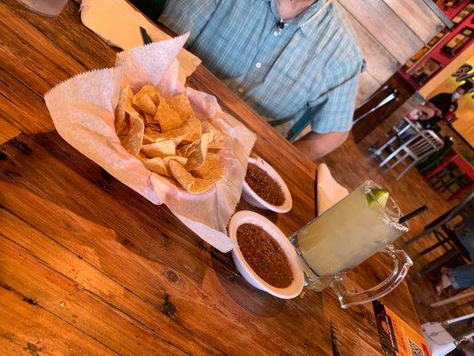 Margarita with chips and salsa.