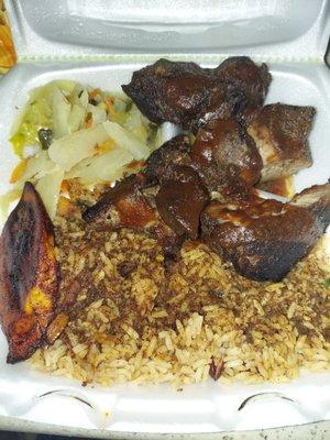 Jerk pork, rice n peas, cabbage, one plantain