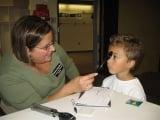 Dr. Price Kowaleski has volunteered every year since 2007 to do school screenings for Kindergarden students in Hancock County.