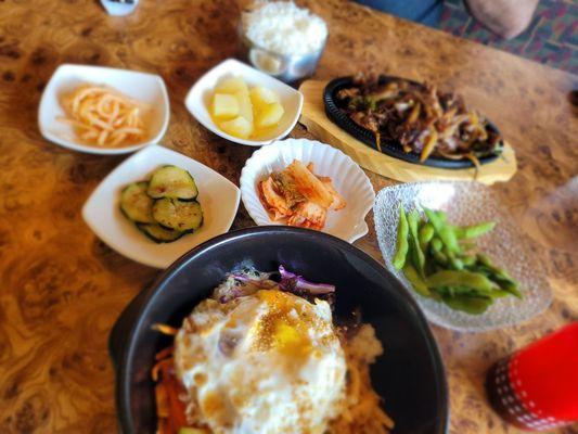 Our meal.  Bibimbap in the front, delicious pork bulgogi (cooked spicy!) in the back.  I can't wait to eat here again.