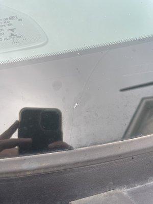 Cracked windshield after repairs were done