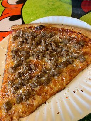 Slice of pizza with beef