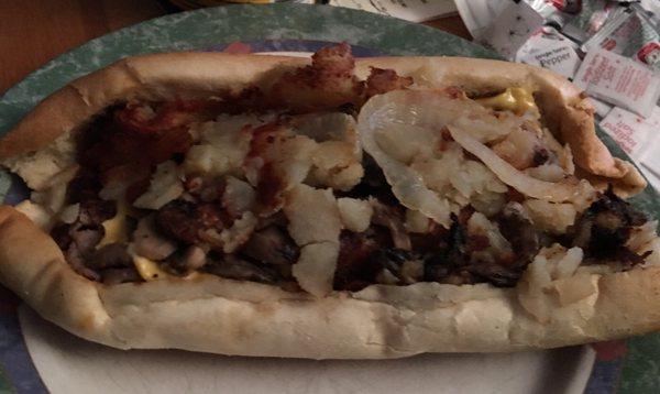 Philly cheesesteak without peppers. Love the fresh bread and crispy home fries on top. It's a great sandwich!