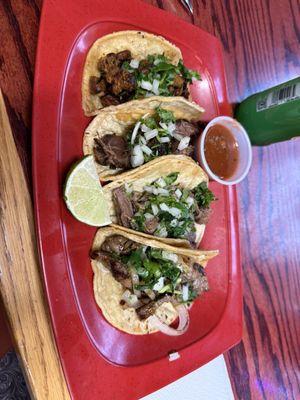 $25 for the following taco plate and soda...dry, fatty,  chewy meat